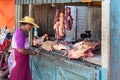 A hot day in Miandrivazo, Madagascar, with a street stall butcher shop open