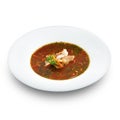 Hot delicious tomato soup with fish and rice