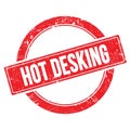 HOT DESKING text on red grungy round stamp Royalty Free Stock Photo