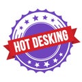 HOT DESKING text on red violet ribbon stamp Royalty Free Stock Photo