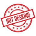 HOT DESKING text written on red vintage round stamp Royalty Free Stock Photo