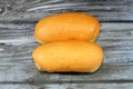 Hot dog bun is a type of soft bun shaped specifically to contain a hot dog or another type of sausage, small side-loading buns for