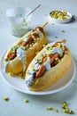 Hot dog with carrots on white plate. vegetarian fast food