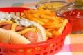 Hot dog with french fries Royalty Free Stock Photo