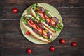 Hot dog. Grilled hot dogs with ketchup on a wooden table. Royalty Free Stock Photo