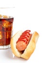 A hot dog and soda glass Royalty Free Stock Photo