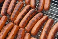 Hot Dogs on a Charcoal BBQ Grill Royalty Free Stock Photo