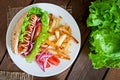 Hot Dogs with French fries on white plate Royalty Free Stock Photo