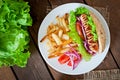 Hot Dogs with French fries on white plate Royalty Free Stock Photo