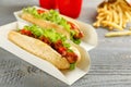 Hot dogs on grey wooden table. Fast food Royalty Free Stock Photo