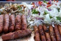Hot dogs and onions cooking outside Royalty Free Stock Photo