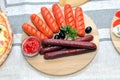 Hot dogs with tomato ketchup on a wooden board Royalty Free Stock Photo