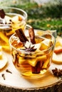 Hot drink, mulled cider or spiced tea or mulled white wine Royalty Free Stock Photo