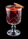 Hot drink. Strawberry and cinnamon punch. On dark background