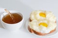 Hot egg sandwiches and pour tea for Breakfast. Selective focus
