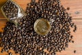 Hot espresso and coffee beans in glass jar. Royalty Free Stock Photo