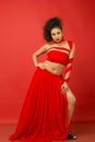 Beautiful female model in a flowy red dress