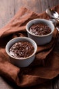 Hot festive French dessert. Chocolate pudding in Ceramic Bakeware. top view Royalty Free Stock Photo