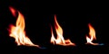 Hot fire flames burning on a pure black background. Bright ignition fire effect