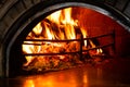 Hot Flames in Pizza Oven. Traditional Firewood Stone Wood Fired Pizza Oven Royalty Free Stock Photo