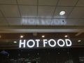 Hot food name board fixed for an newly opened business of selling cooked food items in the event of functions upon orders for