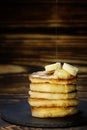 hot, fresh, lush, fried country pancakes with banana slices and dried with syrup Royalty Free Stock Photo