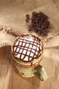Hot frothy coffee cappuccino chocolate topping