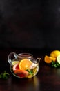Hot fruit tea with lemon, mint, orange, lime and grapefruit