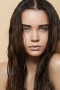 Hot girl with fresh wet hairstyle, fashion make-up Royalty Free Stock Photo