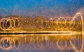 Hot Golden Sparks Flying from Man Spinning Burning Steel Wool Royalty Free Stock Photo