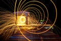 Hot Golden Sparks Flying from Man Spinning Burning Steel Wool on