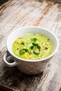 Hot green peas soup on the rustic background Royalty Free Stock Photo