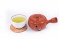 Hot green tea and teapot Royalty Free Stock Photo