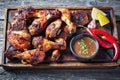 Hot Grilled Jamaican Jerk Chicken on a board