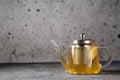 Hot healthy green tea with lemon in glass teapot Royalty Free Stock Photo