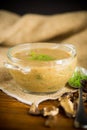 hot homemade vegetable vegetarian soup with dried mushrooms in a glass bowl Royalty Free Stock Photo