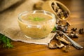 hot homemade vegetable vegetarian soup with dried mushrooms in a glass bowl Royalty Free Stock Photo