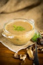 hot homemade vegetable vegetarian soup with dried mushrooms in a glass bowl Royalty Free Stock Photo