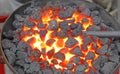 Hot ingot iron working in the workshop of blacksmith