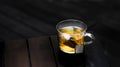 Hot Jasmine Green Tea with tea bag served in a cup isolated on dark background side view Royalty Free Stock Photo