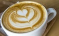 Hot Latte Coffee art in white cup Royalty Free Stock Photo