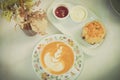 Coffee break set with latte and scone