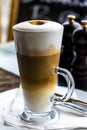 Hot latte macchiato coffee with tasty foam Royalty Free Stock Photo