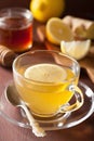 Hot lemon ginger honey tea in glass cup Royalty Free Stock Photo