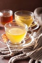 Hot lemon ginger honey tea in glass cup Royalty Free Stock Photo