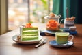 hot matcha latte with a slice of cake, caf setting