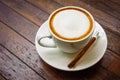 Hot milk coffee on wooden table Royalty Free Stock Photo