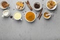 Hot milk, turmeric root, cinnamon sticks, curcuma powder and honey Royalty Free Stock Photo