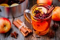 Hot mulled apple cider with cinnamon sticks, cloves and anise Royalty Free Stock Photo