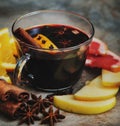 Hot mulled wine with cinnamon, slice of orange, anise and other spices Royalty Free Stock Photo